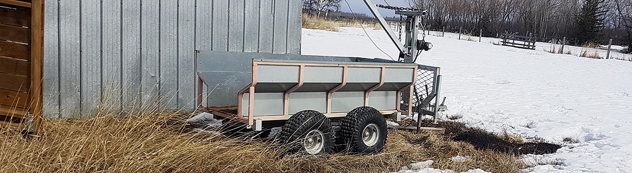 cropped: metal clad barn, 4 wheeler traler, barnyard